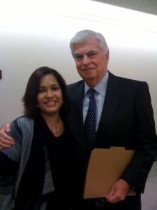 MomsRising member Desiree with Senator Dodd before the hearing.