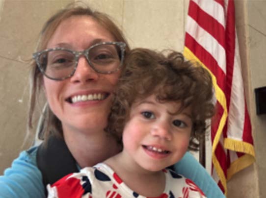 Adrienne Burns with her daughter