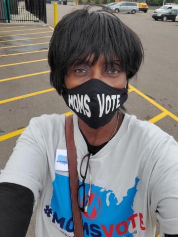 Woman wearing MomsVote mask