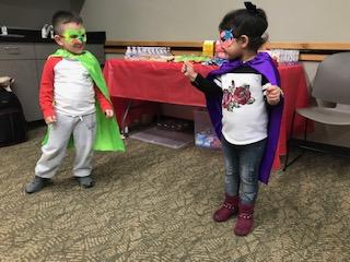 Superhero kids advocating for family-friendly policies and programs