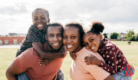 Black family smiling