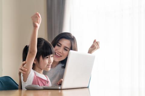 Mom and child cheering