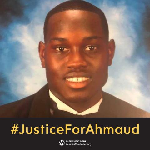 [IMAGE DESCRIPTION: A photo of a young Black man smiling at the camera, wearing a tuxedo, with the words Justice For Ahmaud underneath.]