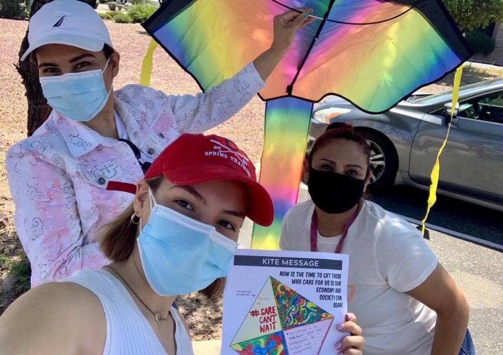 MomsRising members in Tucson showing off their Care Can't Wait Kite Messages