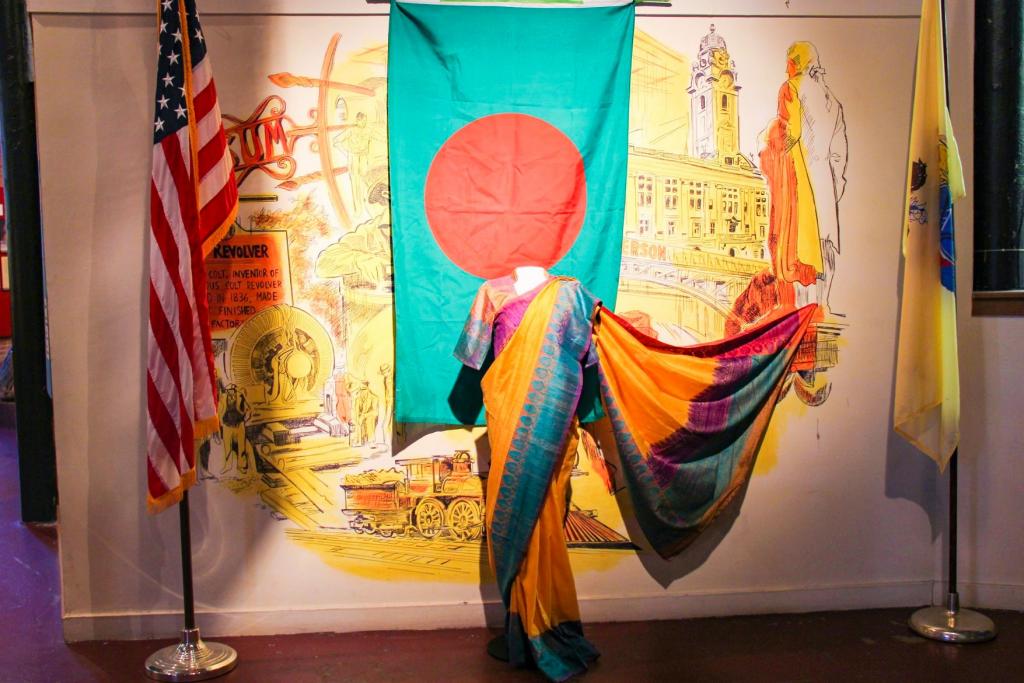 A traditional sari welcomes museum guests