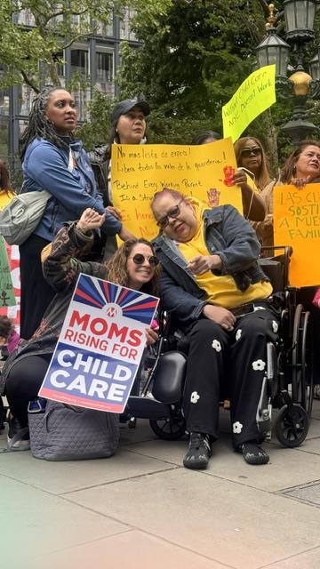 MomsRising member and early learning professional Gladys Jones with MomsRising staff at an event.