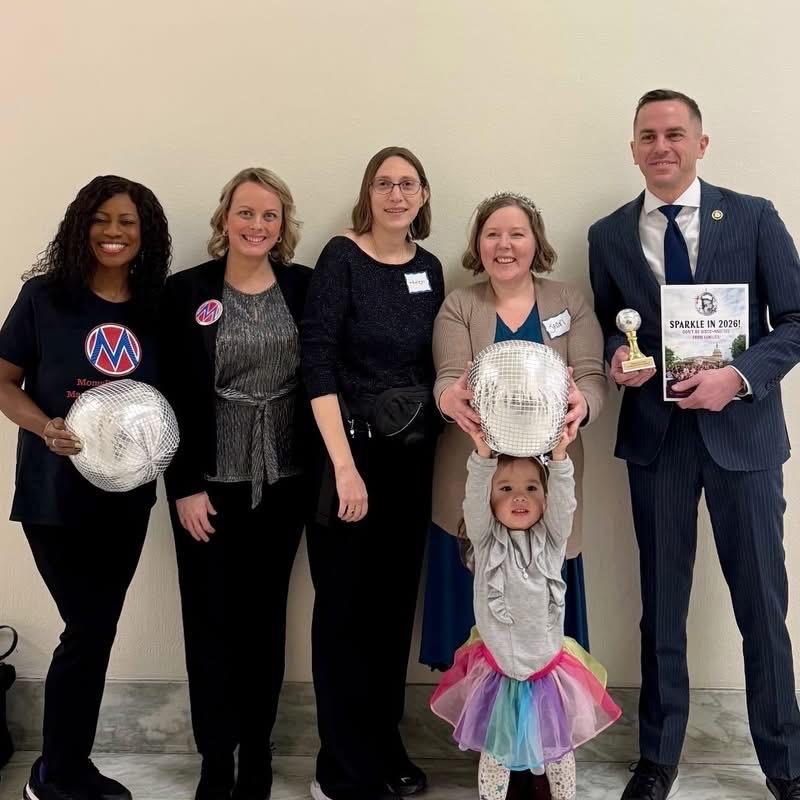 Rob. Menendez with 5 MomsRising members and staff at MomsRising's Mombassador disco-themed event