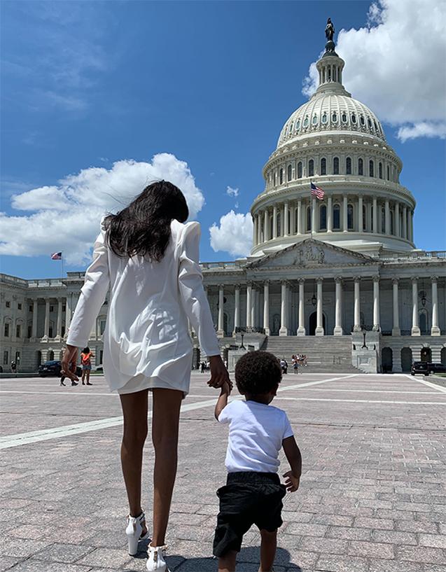 photo of Beacon Jacqueline and son walking to Capitol