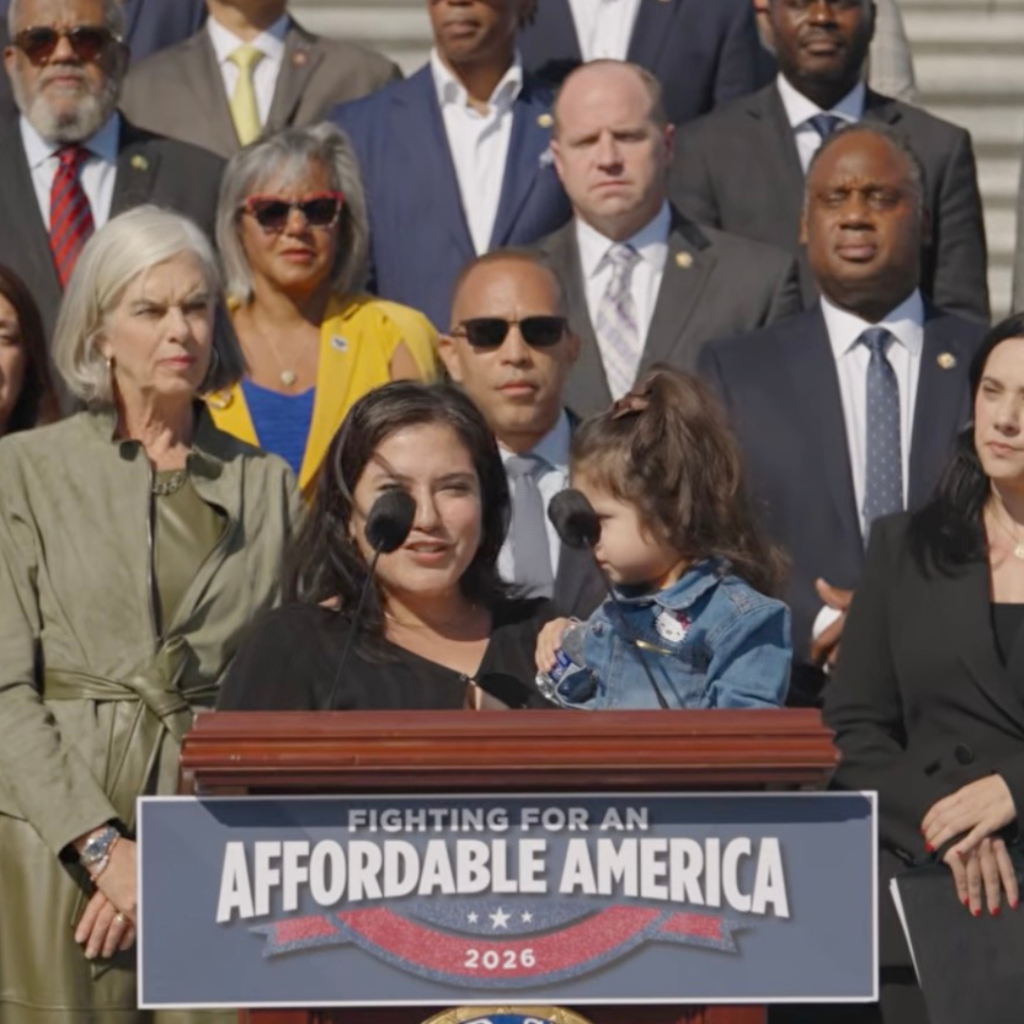MomsRising member Kat with her daughter Rebecca sharing her affordability story at House Democratic Leader Hakeem Jeffries’ affordability press conference MomsRising member Kat & her daughter sharing her affordability story Rep. Jeffries' press event