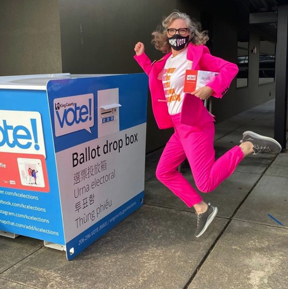 Instagram photo of Kristin Rowe-Finkbeiner jumping for joy for voting early
