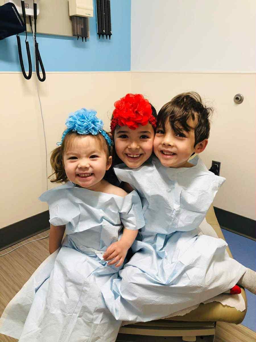 My children, visiting their doctor for annual exams and COVID boosters earlier this year.