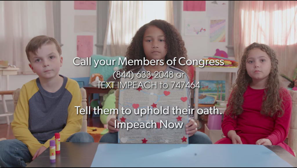 Children hold up a Constitution puzzle with text "Call your members of Congress"