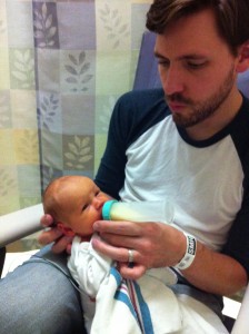 My husband, Matt, feeding Bea in the NICU.